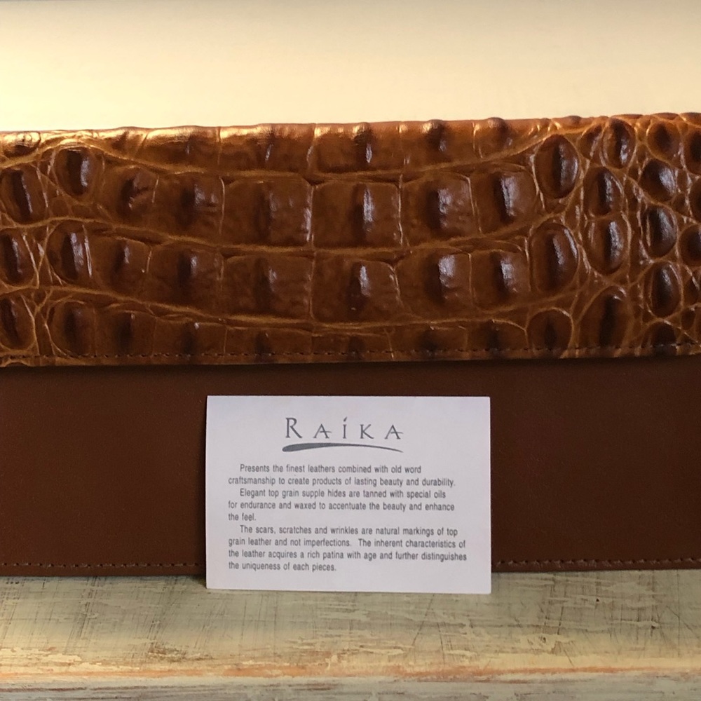 Raika leather clutch NWOT